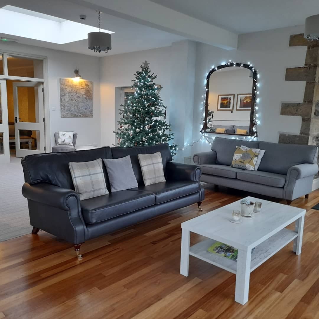 The lounge decorated for Christmas at Howgills House