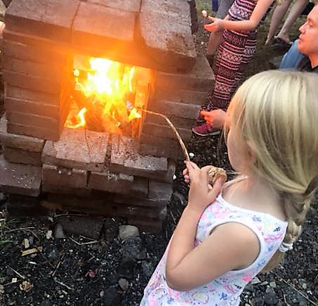 Child toasting a marshmallow